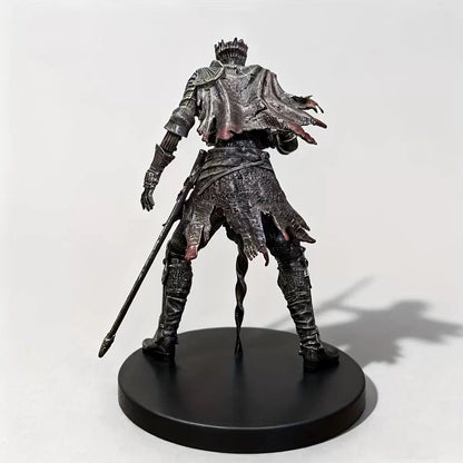 Rear view showing the weathered cape and armor details of the knight figure